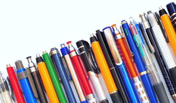 Pens of many colors and features lined up to show wide selection